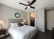 Thumbnail 65 of 73 - a bedroom with a bed and a ceiling fan at Scottsdale Hayden Townhomes, Scottsdale, AZ, 85257