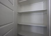 Thumbnail 68 of 73 - a close up of the built in shelving in the walk in closet at Scottsdale Hayden Townhomes, Scottsdale, Arizona
