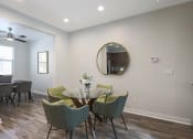Thumbnail 10 of 73 - a dining room with a table and chairs at Scottsdale Hayden Townhomes, Scottsdale
