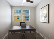Thumbnail 43 of 73 - a home office with a large desk and two chairs at Scottsdale Hayden Townhomes, Arizona, 85257
