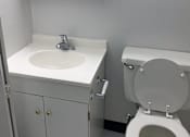 Thumbnail 11 of 15 - a small bathroom with a sink and a toilet at Clinton Towers, Bronx, NY
