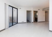 Thumbnail 17 of 81 - Spacious living room with neutral walls and ample natural light.