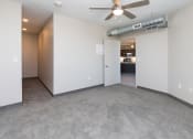 Thumbnail 24 of 81 - Bright, vacant bedroom with neutral walls and carpet flooring.
