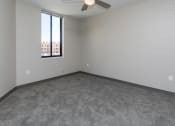 Thumbnail 46 of 81 - Spacious living room with neutral walls and ample natural light.