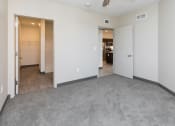 Thumbnail 65 of 81 - Spacious living room with neutral walls and ample natural light.