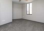 Thumbnail 69 of 81 - Spacious living room with neutral walls and ample natural light.