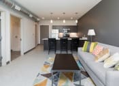 Thumbnail 75 of 81 - Spacious living room with neutral walls and ample natural light.
