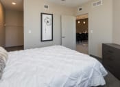 Thumbnail 80 of 81 - Bright, vacant bedroom with neutral walls and carpet flooring.
