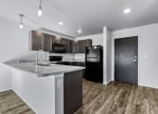 Thumbnail 3 of 35 - Kitchen with black appliances