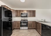 Thumbnail 20 of 55 - kitchen with black appliances