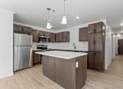 Thumbnail 14 of 44 - a large kitchen with stainless steel appliances and wooden cabinets
