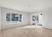 Thumbnail 48 of 68 - A large empty room with a view of the street outside.