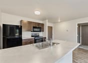 Thumbnail 5 of 55 - kitchen with black appliances