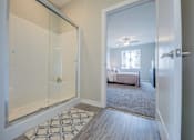 Thumbnail 25 of 29 - Modern bathroom featuring white oak vanity and walk-in shower