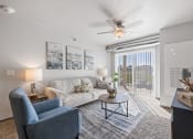 Thumbnail 1 of 20 - Spacious living room with neutral walls and ample natural light.