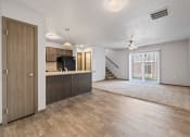 Thumbnail 6 of 20 - Spacious, combined kitchen and living room with breakfast bar seating.