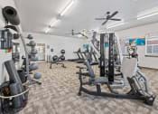 Thumbnail 15 of 20 - Modern gym with rows of cardio equipment.