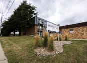 Thumbnail 7 of 15 - the front of a brick building with a sign that reads dasher park