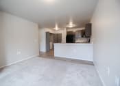 Thumbnail 3 of 24 - looknig into kitchen from living room