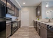 Thumbnail 16 of 29 - Stylish kitchen perfect for cooking and entertaining at White Oak