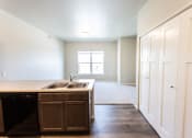 Thumbnail 5 of 24 - looking at living room from kitchen
