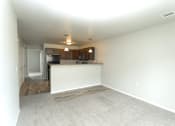 Thumbnail 4 of 20 - kitchen and living room
