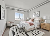 Thumbnail 5 of 38 - A bedroom with a large bed, a bench, and a rug with a black and white design.