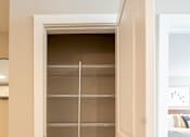 Thumbnail 25 of 50 - A white door with a glass panel and a handle.