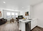 Thumbnail 5 of 17 - the preserve at ballantyne commons apartment kitchen and living room