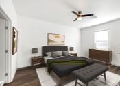 Thumbnail 6 of 17 - a bedroom with a large bed and a ceiling fan