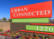 Thumbnail 23 of 23 - a sign that reads urban connected luxury apartments in front of a road