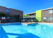 Thumbnail 12 of 23 - the swimming pool at the apartments for rent