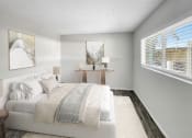 Thumbnail 7 of 22 - a living room with a couch and a bed and windows