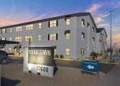 Thumbnail 17 of 17 - a large white building with a sign in front of it