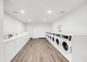 Thumbnail 13 of 17 - the preserve at ballantyne commons laundry room with washes and dryers