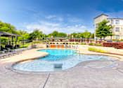 Thumbnail 60 of 72 - our apartments have a resort style pool with lounge chairs at Radius on Grove, Texas, 78741