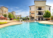 Thumbnail 53 of 72 - a swimming pool with a building in the background at Radius on Grove, Texas, 78741