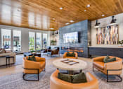 Thumbnail 19 of 22 - Modern living room with a wooden ceiling and a fireplace at Kessler, Fort Worth, TX, Texas, 76137