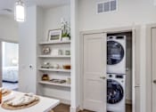 Thumbnail 4 of 22 - Modern laundry room with a washer and dryer at Kessler, Texas