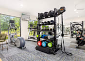 Thumbnail 55 of 72 - the preserve at ballantyne commons fitness room with weights and cardio equipment at Radius on Grove, Austin, TX