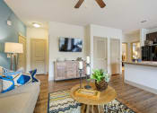 Thumbnail 43 of 59 - a living room with a couch and a coffee table at Alvista Round Rock, Round Rock, TX
