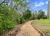 Thumbnail 40 of 72 - a path leading to a building at Radius on Grove, Austin, TX, 78741