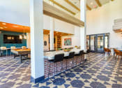 Thumbnail 26 of 65 - a restaurant with a blue and white tiled floor and tables with chairs at Birdie on Woodland Greens, Austin, 78726