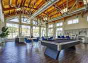 Thumbnail 34 of 39 - Billiards Table at The Landings at Brooks City-Base Apartments , San Antonio, TX