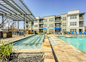 Thumbnail 30 of 39 - Swimming Pool at The Landings at Brooks City-Base Apartments , San Antonio, TX