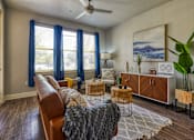 Thumbnail 39 of 39 - Living room area at The Landings at Brooks City-Base Apartments , San Antonio