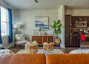 Thumbnail 38 of 39 - Living room at The Landings at Brooks City-Base Apartments , San Antonio, 78235
