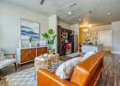 Thumbnail 36 of 39 - Living room at The Landings at Brooks City-Base Apartments , TX, 78235
