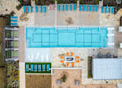 Thumbnail 3 of 65 - Aerial view of a swimming pool at Birdie on Woodland Greens, Austin, Texas