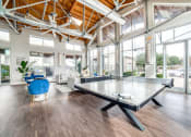 Thumbnail 21 of 27 - the preserve at ballantyne commons community room at The Landings at Brooks City-Base, Texas, 78235